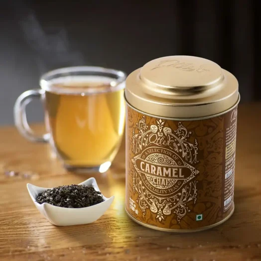 Otler Caramel Chai Black Tea packaging with a warm, inviting background